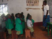 Muhada: Orphans, many infected with HIV, enjoying class. Muhada: Orphans, many infected with HIV, enjoying class.